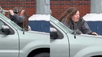 Alman kadının arabasıyla mücadelesi viral oldu! Buzları böyle kırmaya çalıştı